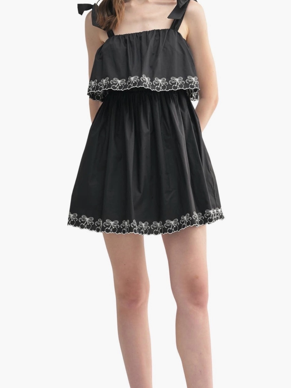Lush Black Mini Skirt with White Floral Embroidery